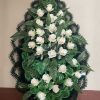 Венок В14 — траурный ритуальный венок из белых роз и зелени. Идеально подходит для церемоний и памят.
